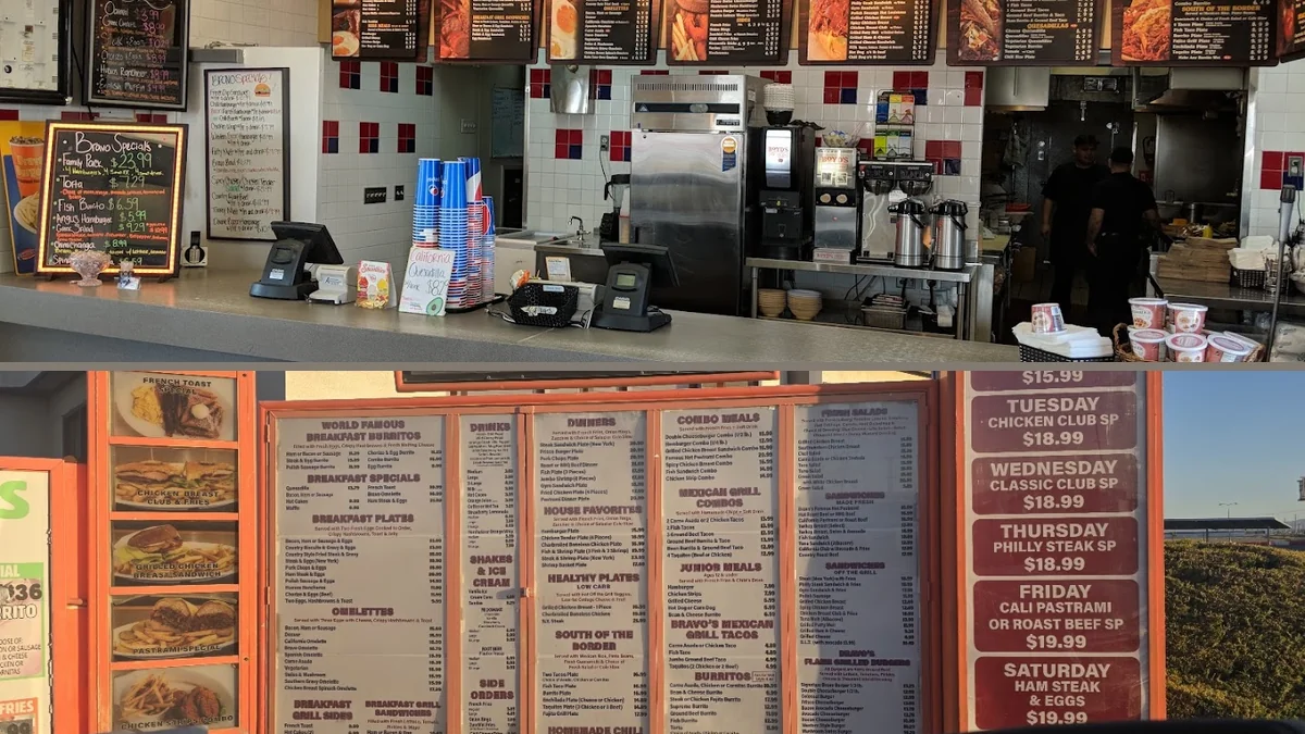 Outdoor seating beside a fast-food restaurant.